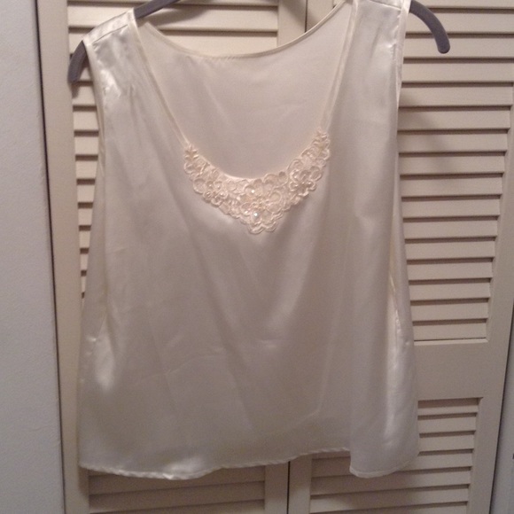 Ivory silky top with appliqué