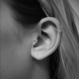 star and heart set cartilage piercing