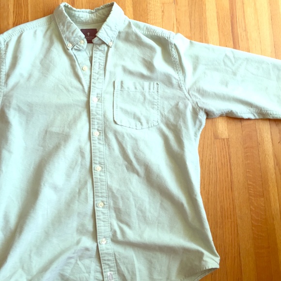 light green button down shirt