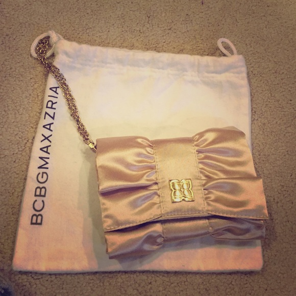 BCBG small champagne colored clutch