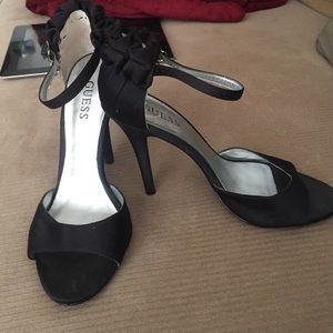 Guess, black heels.