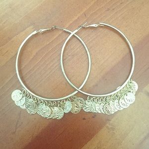 Large golden hooped earrings