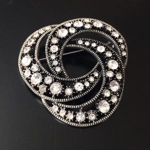 Silver broach