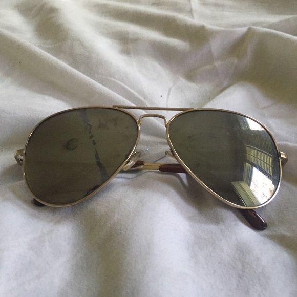 Ray Ban sunglasses. Has a streak mark on them.