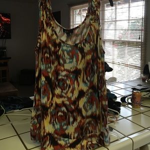 Tank with braided straps.