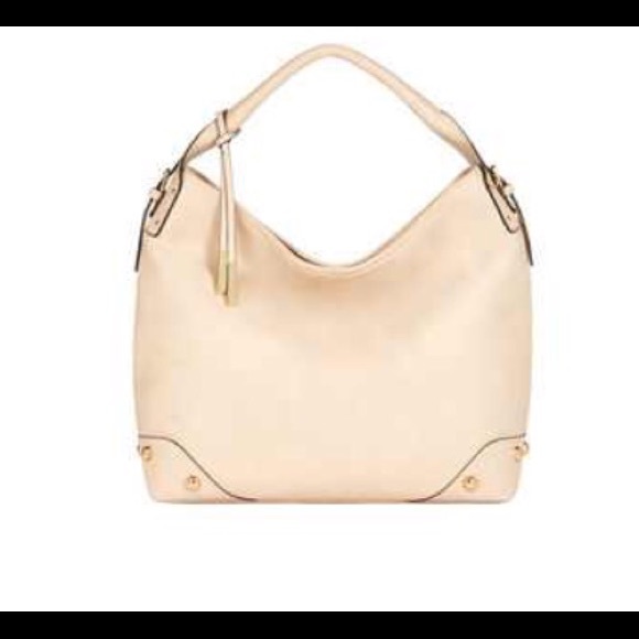 Brand new cream colored handbag NWOT