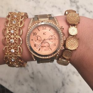 Rose gold watch and bracelets!