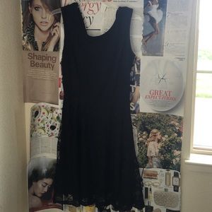 Cute flowy lace black dress.