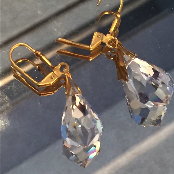 Gold crystal drop earrings.