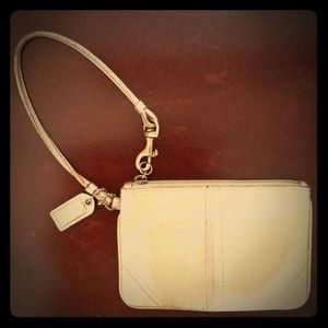Coach gold wristlet