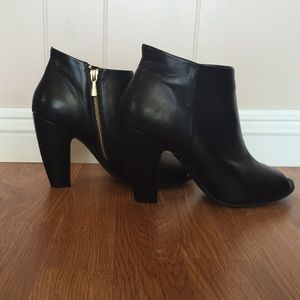 Black pep toe booties.