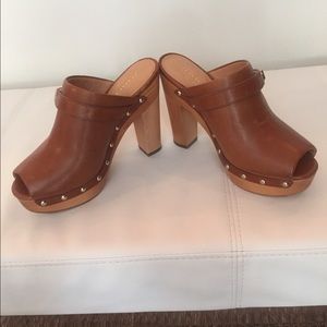 Coach tan leather slip on's