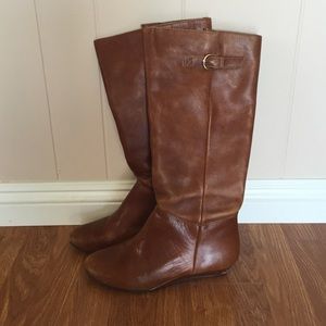Steve Madden cognac leather boots.