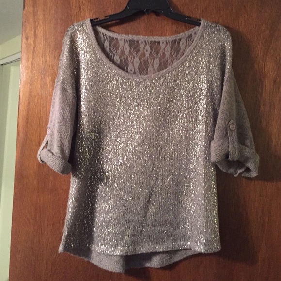 Gray sequin and lace sweater.