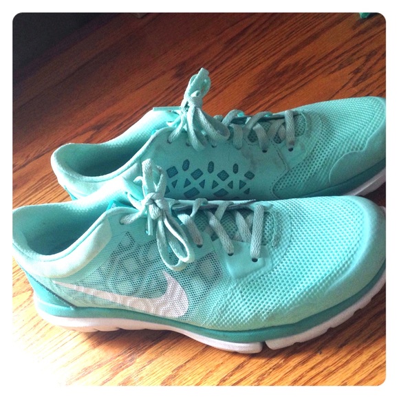 Mint colored Nike tennis shoes