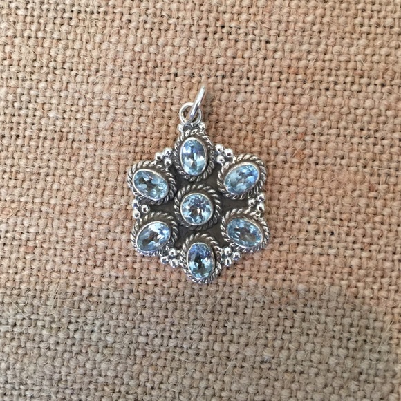 Gorgeous faceted flower pendant- sterling silver