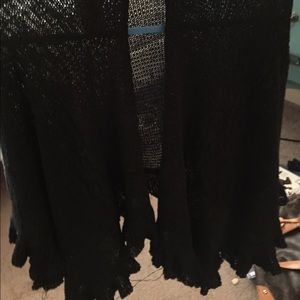 Black knit shawl with ruffle edges
