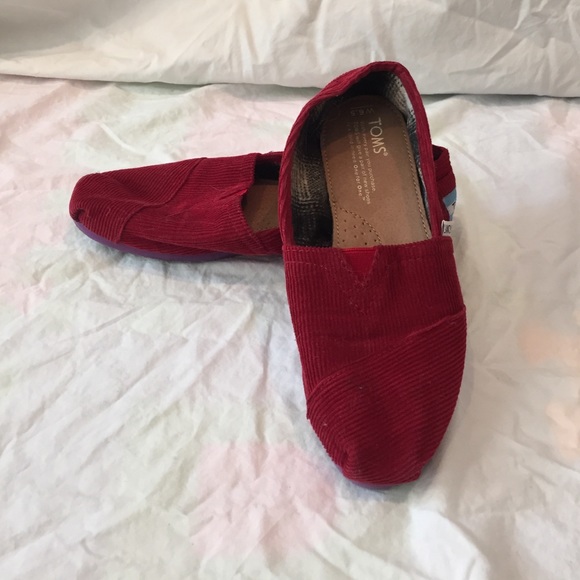 TOMS 6.5 Red Corduroy slip ons, never been worn.