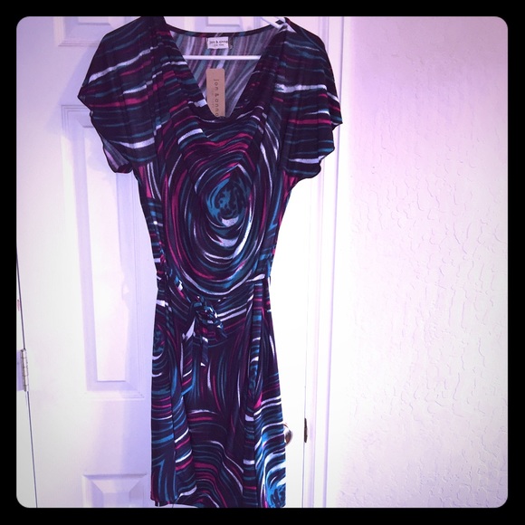 New multi colored dress with tie in back💐