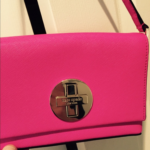 Pink Kate Spade clutch bag.