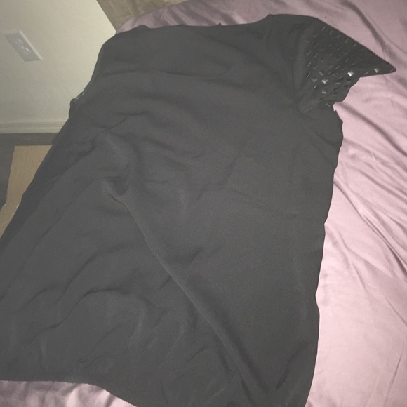 Black shirt with square metal decor on sleeves