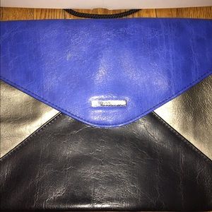 Kenneth Cole Reaction tri color clutch purse
