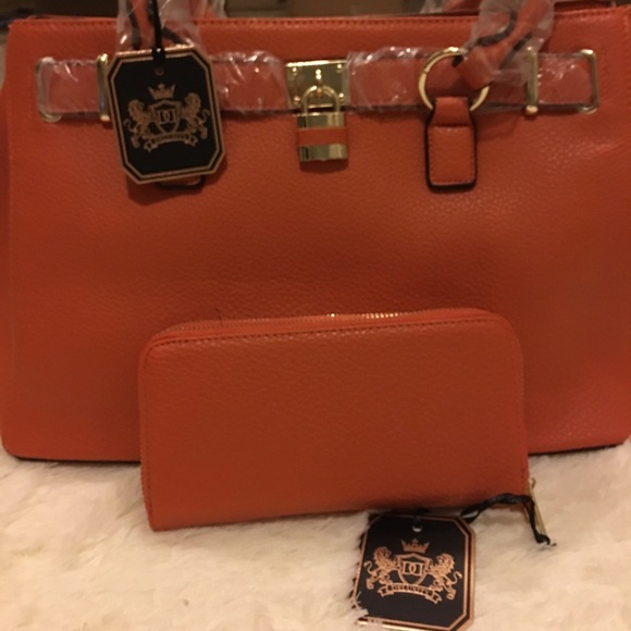 Portia de Rossi handbag with matching wallet