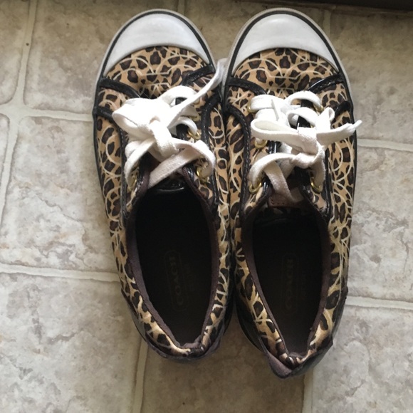 Leopard print coach sneakers.