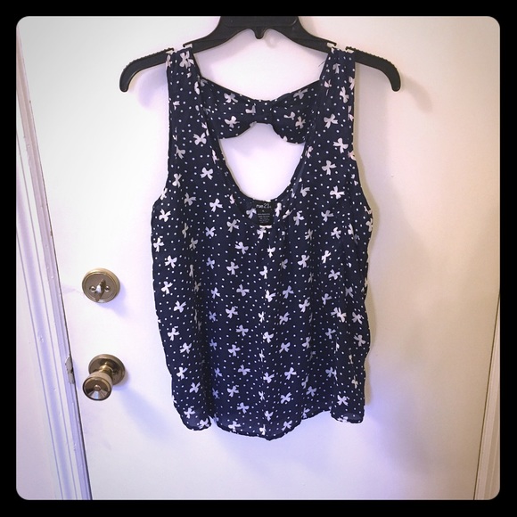 Navy blue tank with white bows.