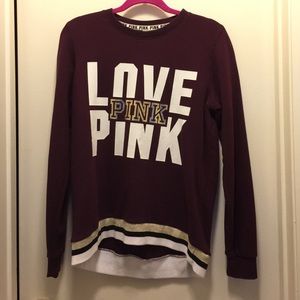 Pink burgundy sweatshirt.