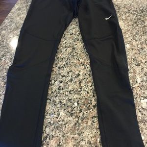 Like new Nike Dri-Fit running tights.