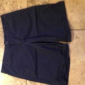 Navy Bermuda shorts. Boyfriend roll up khakis.