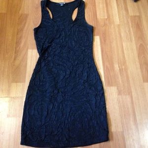 Tight Fitting Black Dress with Textured Material