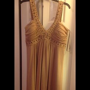 Beautiful beige sundress with grommet detailing