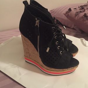 Black Platform Sandals with detail in the heels. 6