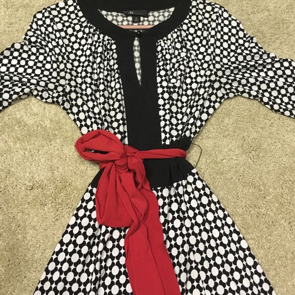 Size Medium black and white dress with red belt!