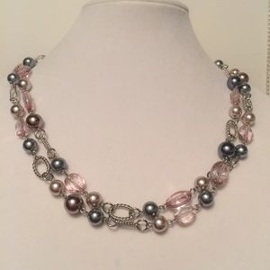 Long silver, gray, & pink pearl necklace.