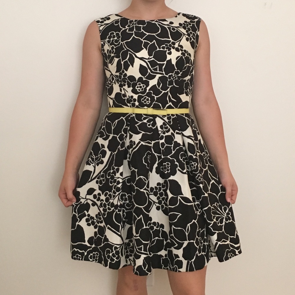 black and white patterned dress with yellow bow