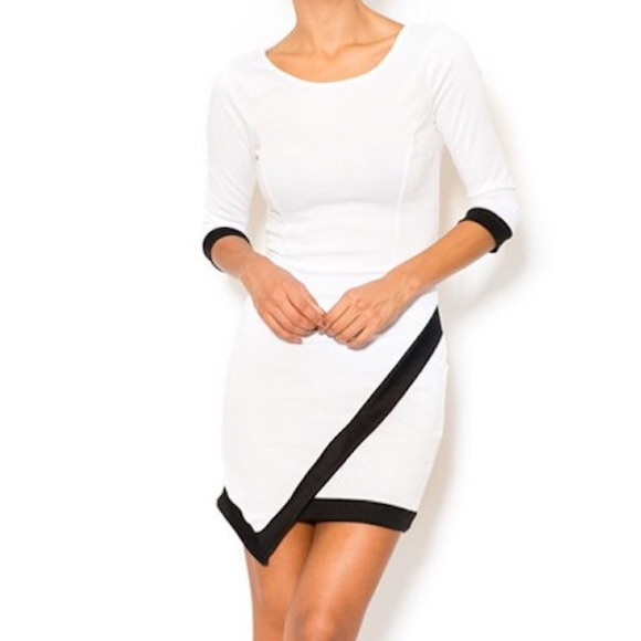White asymmetrical dress with black trimming