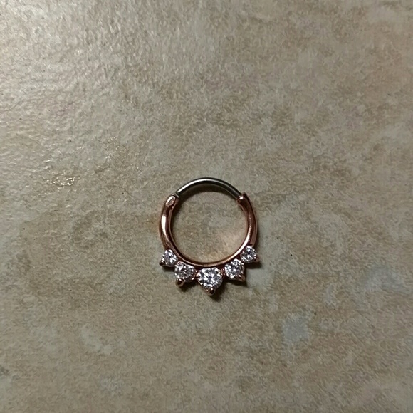 Rose gold septum clicker.