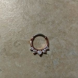 Rose gold septum clicker.