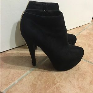 Black and gold heeled booties