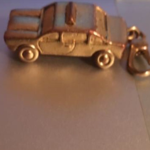 C.Wonder Gold Plated Taxi Charm