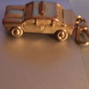 C.Wonder Gold Plated Taxi Charm