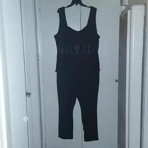 Black one piece jump suit sleeveless zipper