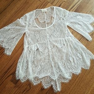 Sheer lace scallop bottomed top