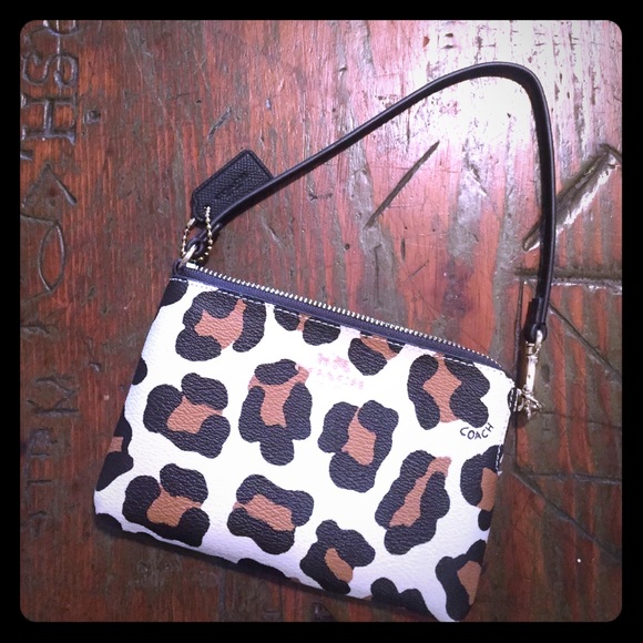 Coach ocelot wristlet perfect condition!