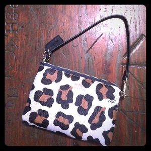 Coach ocelot wristlet perfect condition!