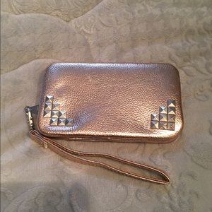 2-in-1 wallet/ clutch and iPhone 5/5s case.