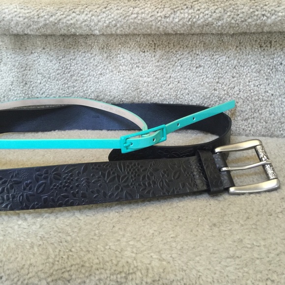Black floral belt and thin bright turquoise belt